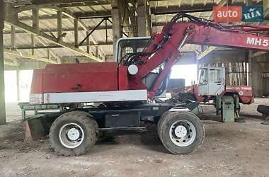 Екскаватор навантажувач O&K MH 5 1993 в 