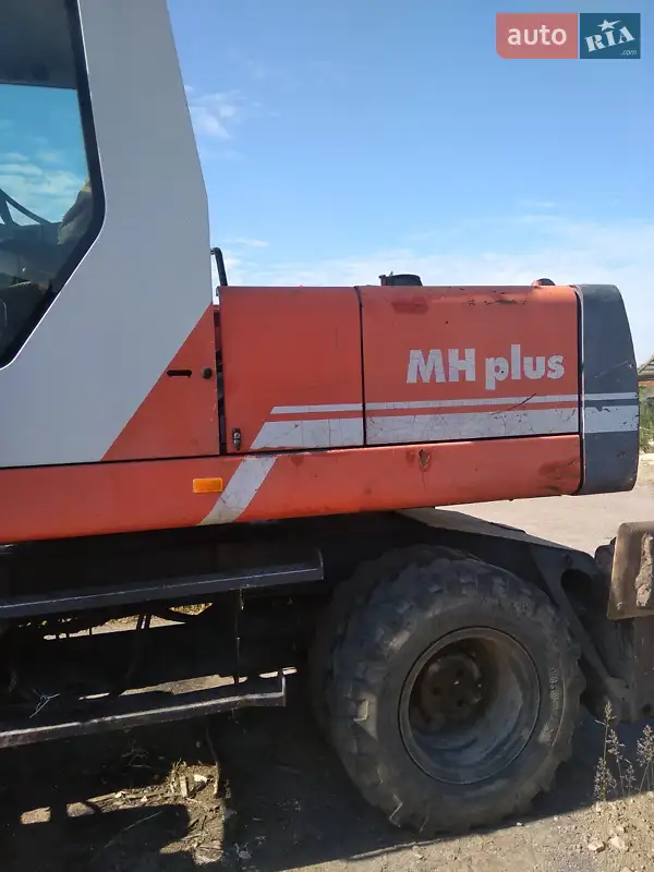 Экскаватор погрузчик O&K MH 2000 в 