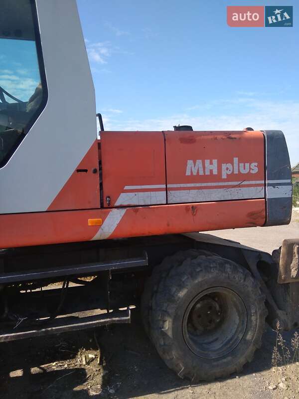 Экскаватор погрузчик O&K MH 2000 в Хмельницком