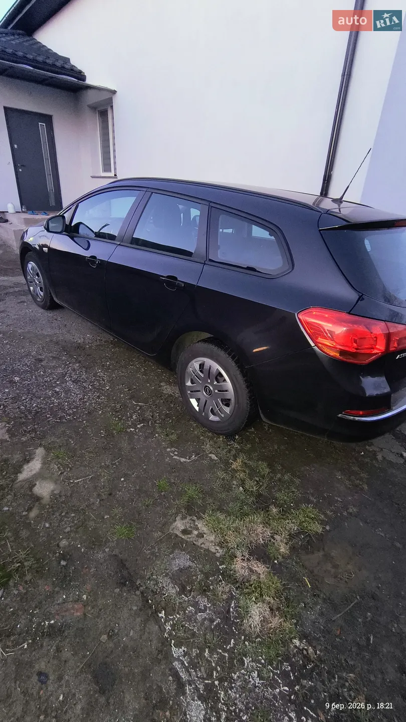 2013 Opel Astra - фото 1