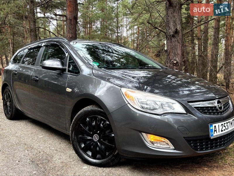 2011 Opel Astra, VIN W0LPD8EG1C8038297:plate — фото 1 (autoria)