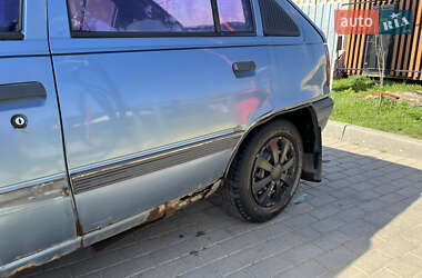 Хэтчбек Opel Kadett 1990 в 