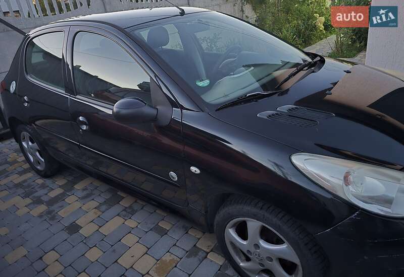 Хетчбек Peugeot 206+ 2012 в Києві фото 16 Хетчбек Peugeot 206+ 2012 в Києві