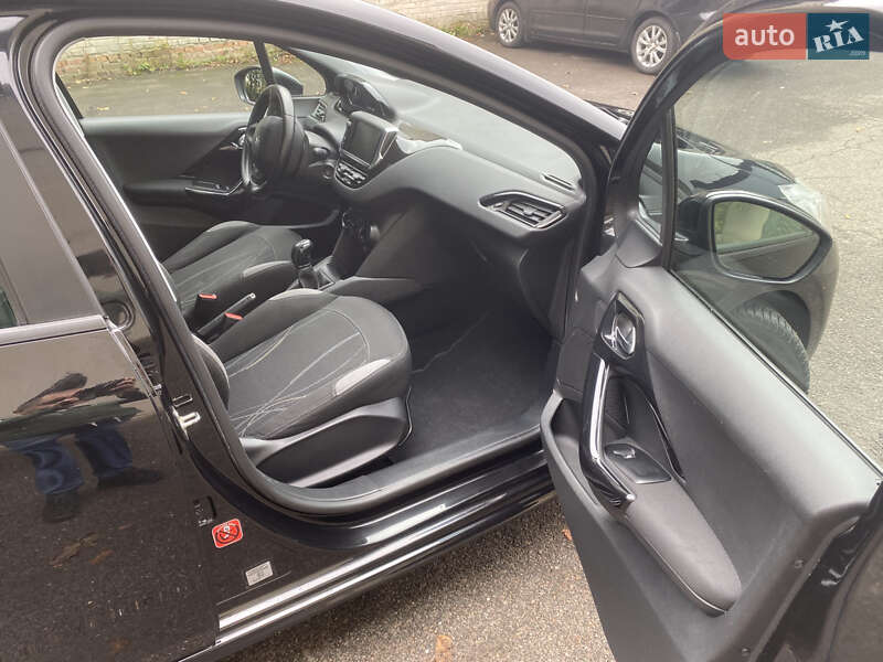 Хэтчбек Peugeot 208 2014 в Луцке фото 14 Хэтчбек Peugeot 208 2014 в Луцке