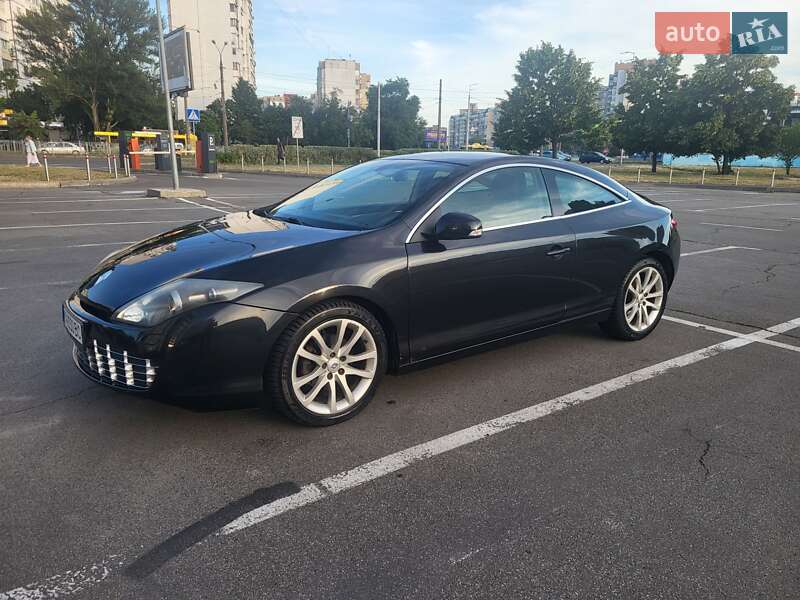 Купе Renault Laguna 2011 в 