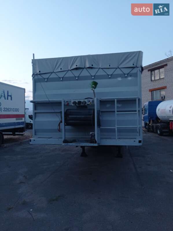 Бортовой полуприцеп Schmitz Cargobull S01 2000 в Черкассах