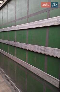 Бортовой полуприцеп Schmitz Cargobull S01 2010 в 