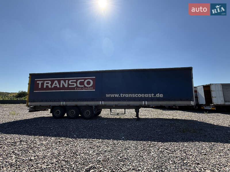 Бортовой полуприцеп Schmitz Cargobull S01 2002 в Киеве