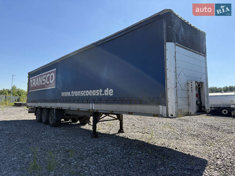 Бортовой полуприцеп Schmitz Cargobull S01 2002 в Киеве