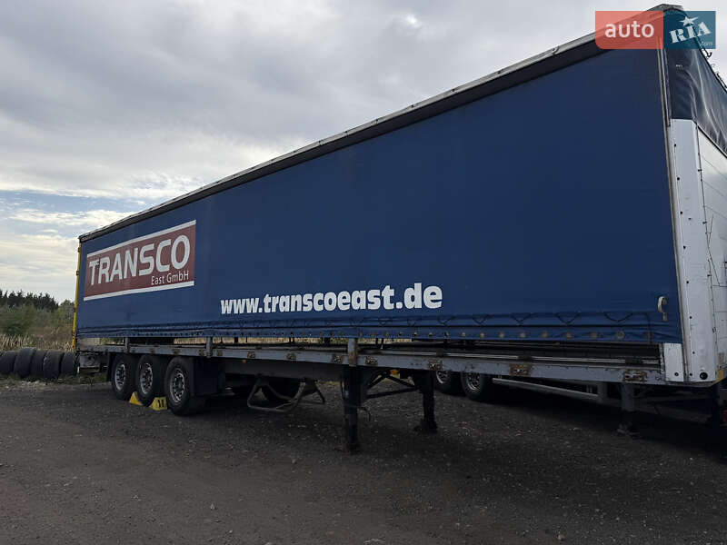 Бортовой полуприцеп Schmitz Cargobull S01 2002 в Киеве