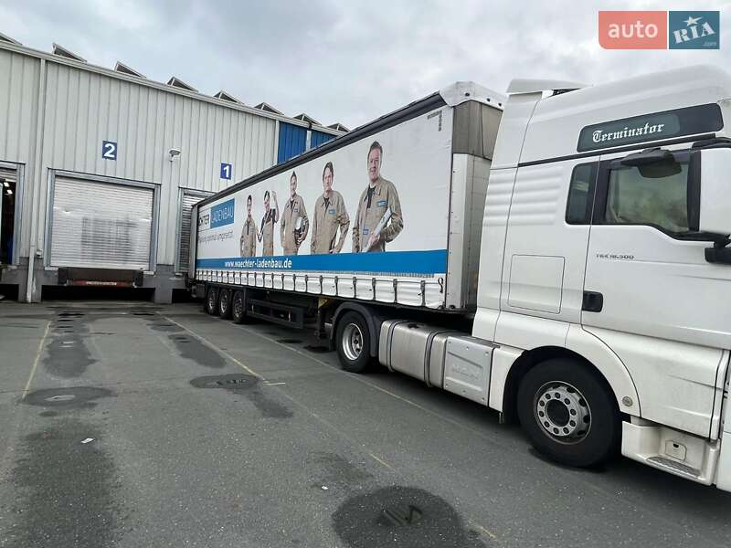 Бортовий напівпричіп Schmitz Cargobull SAF 2013 в Вінниці