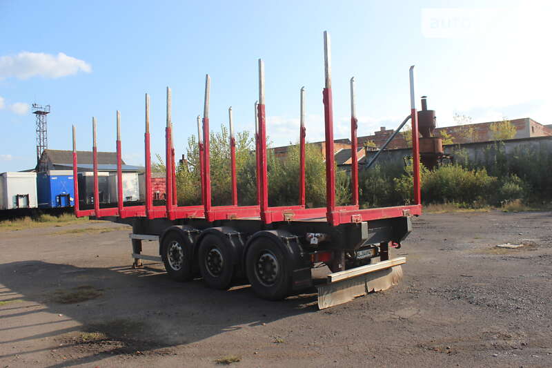 Лесовоз / Сортиментовоз - полуприцеп Schmitz Cargobull SAF 2004 в Хусте