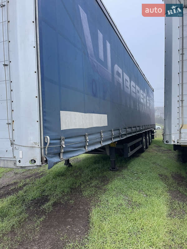 Тентований борт (штора) - напівпричіп Schmitz Cargobull SCS 2010 в Ужгороді