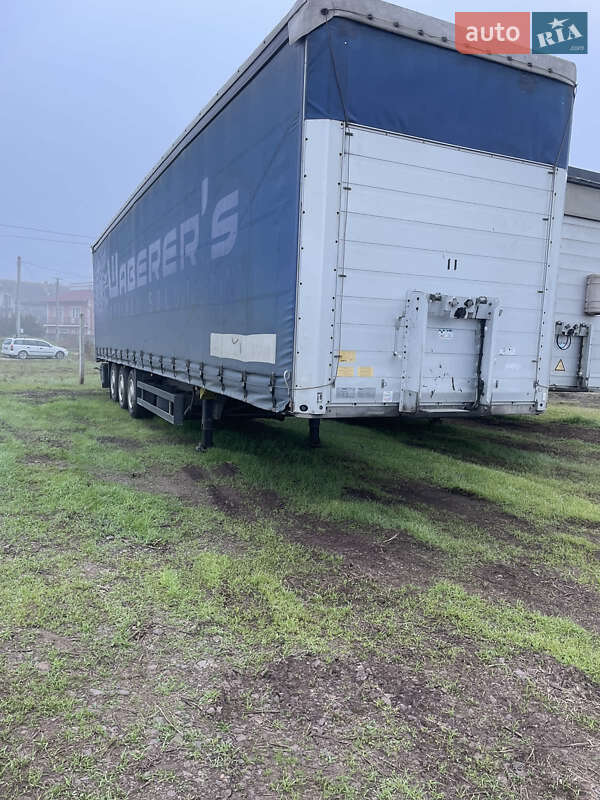Тентований борт (штора) - напівпричіп Schmitz Cargobull SCS 2010 в Ужгороді