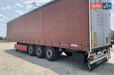 Тентованный борт (штора) - полуприцеп Schmitz Cargobull SCS 2012 в Львове