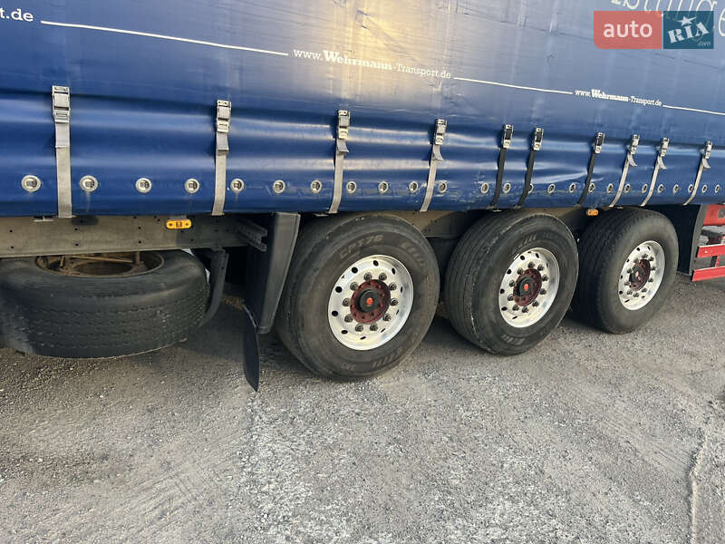 Бортовий напівпричіп Schmitz S-01 2011 в Кременчуці