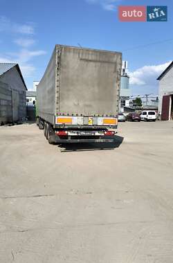 Бортовой полуприцеп Schmitz S-01 2003 в 