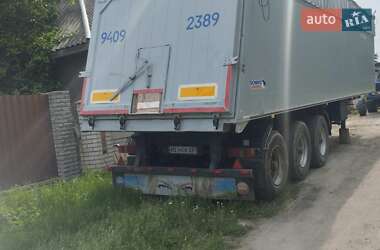 Самосвал полуприцеп Schmitz SCS 24 2001 в 
