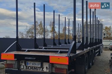 Лесовоз / Сортиментовоз - полуприцеп Schmitz SCS L24 2001 в Калуше