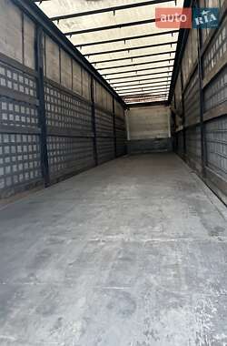 Бортовой полуприцеп Schmitz SCS S3 2007 в 