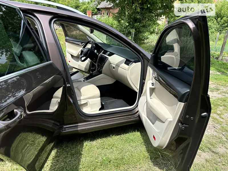 Skoda Octavia 2013 VIN TMBJG9NEXE0028419 фото оголошення 10 з 53