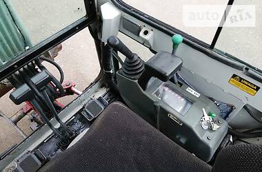 Эвакуатор Takeuchi TB 2010 в 