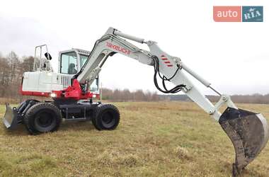 Колесный экскаватор Takeuchi TB 2008 в 