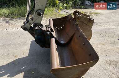 Колесный экскаватор Takeuchi TB 2007 в 