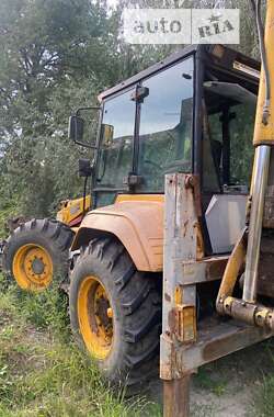 Екскаватор навантажувач Terex 965 1994 в Хусті