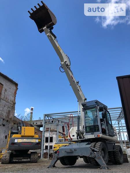 Колесный экскаватор Terex TW 2008 в 