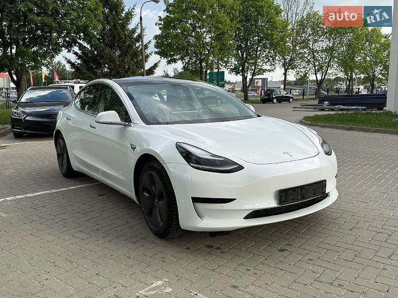 2020 Tesla Model 3, VIN 5YJ3E1EA4LF785215:plate — zdjęcie 1 (autoria)