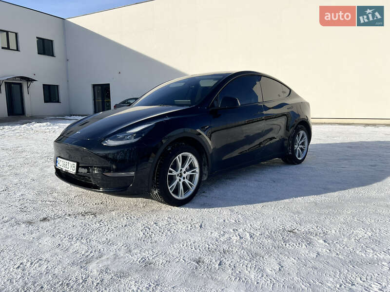 2023 Tesla Model Y, VIN 7SAYGDEEXPA105778:plate — фото 1 (autoria)