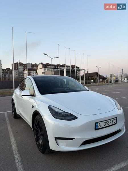 2022 Tesla Model Y, VIN 7SAYGDEF2NF558690:plate — фото 1 (autoria)