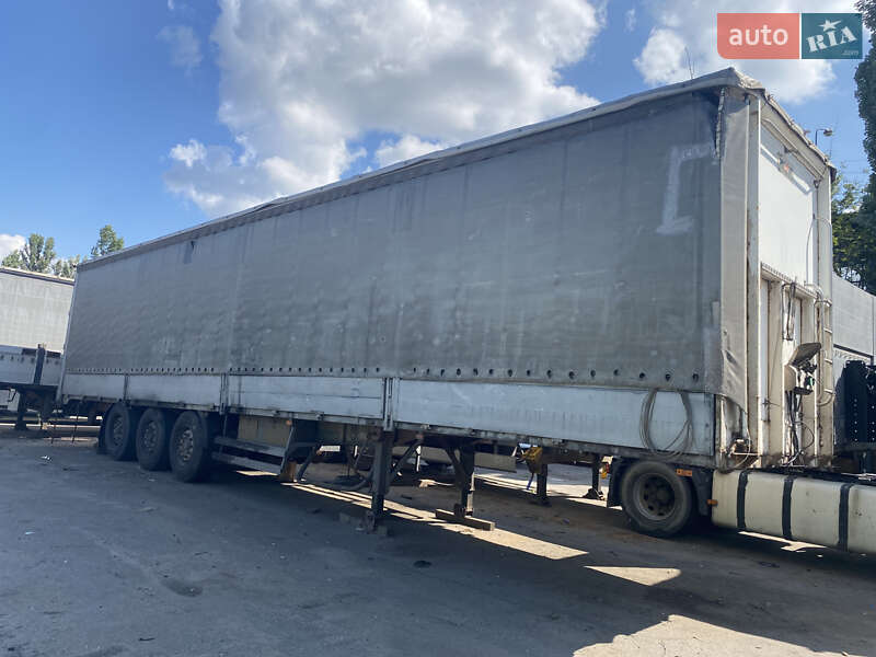Бортовой полуприцеп Titan CS3 2001 в 
