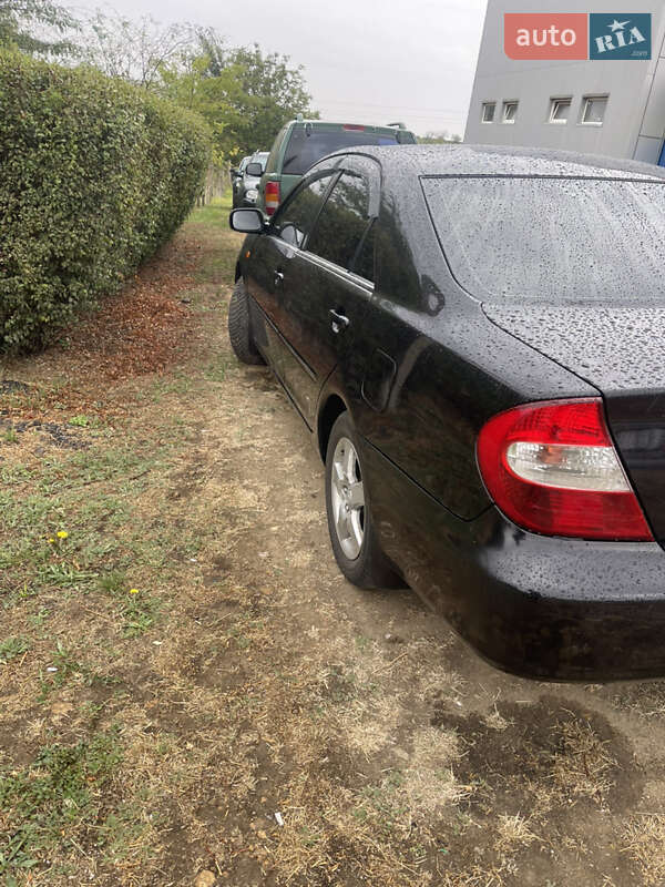 Седан Toyota Camry 2004 в Южном фото 12 Седан Toyota Camry 2004 в Южном
