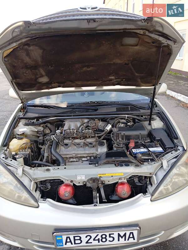 Седан Toyota Camry 2004 в Романове