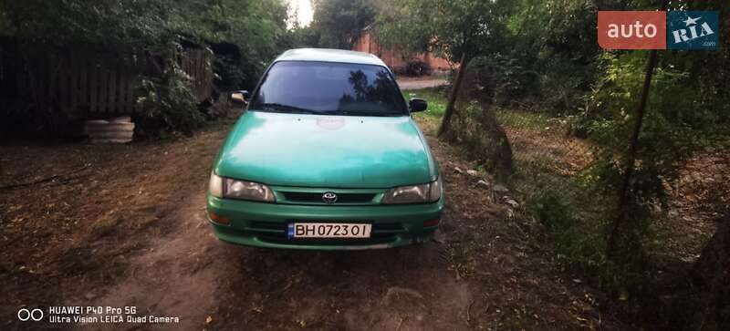 Хетчбек Toyota Corolla 1997 в Турбовом фото Хетчбек Toyota Corolla 1997 в Турбовом
