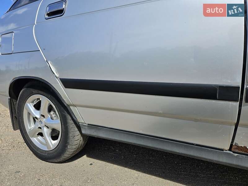 Хэтчбек ВАЗ / Lada 2112 2003 в Помошной фото 10 Хэтчбек ВАЗ / Lada 2112 2003 в Помошной
