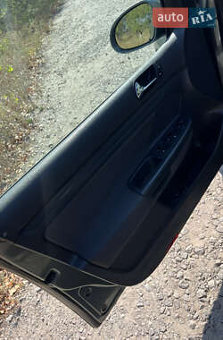 Хетчбек Volkswagen Golf 2004 в 