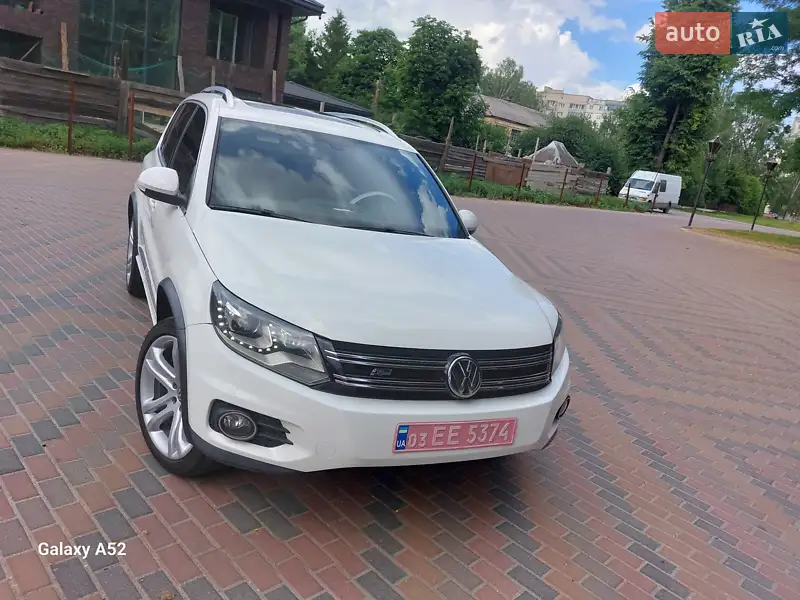 Volkswagen Tiguan 2013 VIN WVGAV3AX1EW038579 фото оголошення 14 з 73