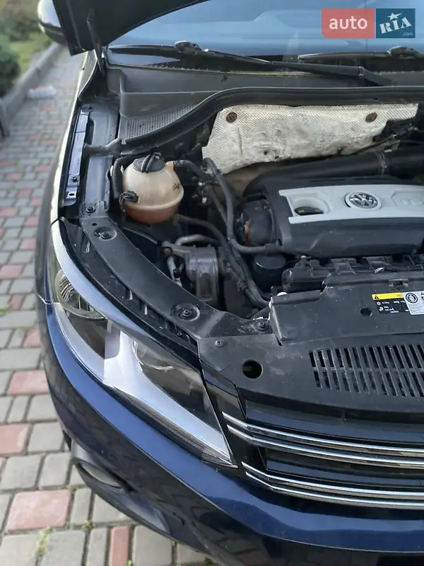 Volkswagen Tiguan 2013 VIN WVGJV3AX8DW599523 фото оголошення 5 з 63