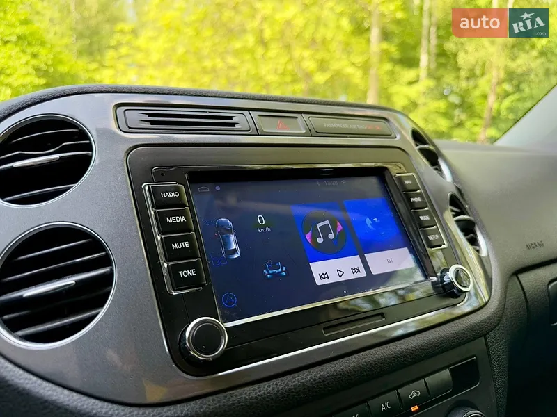 Volkswagen Tiguan 2012 VIN WVGAV7AX7DW543709 фото оголошення 36 з 117