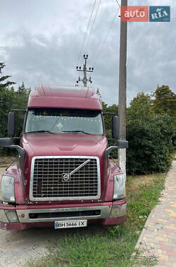 Тягач Volvo VNL 670 2004 в 